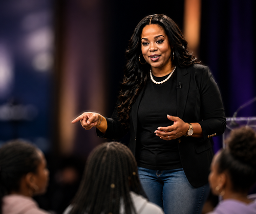 Yasha Sterling speaking on stage